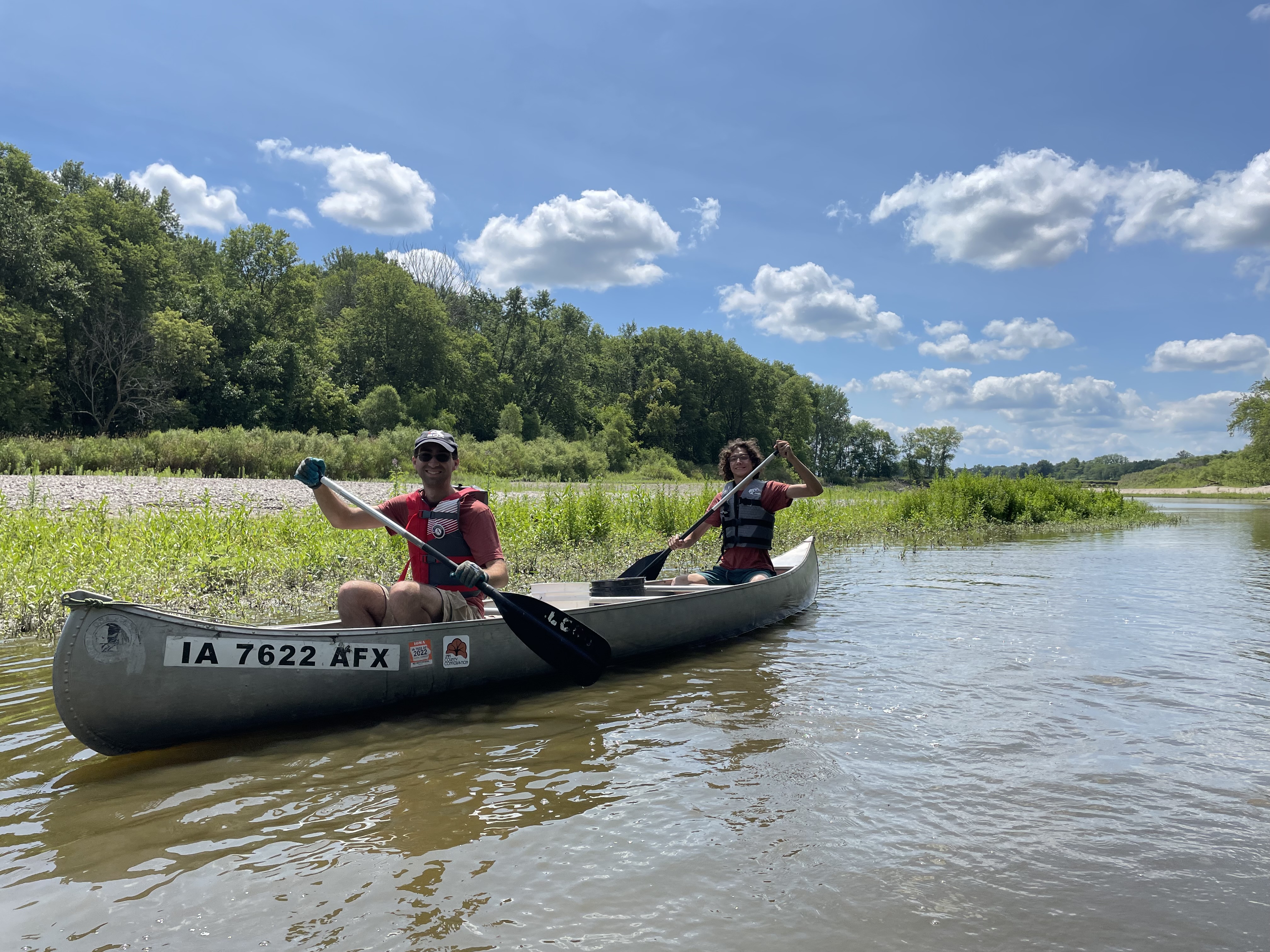 Two GIA members participating in Iowa Project Award - cleaning up a river